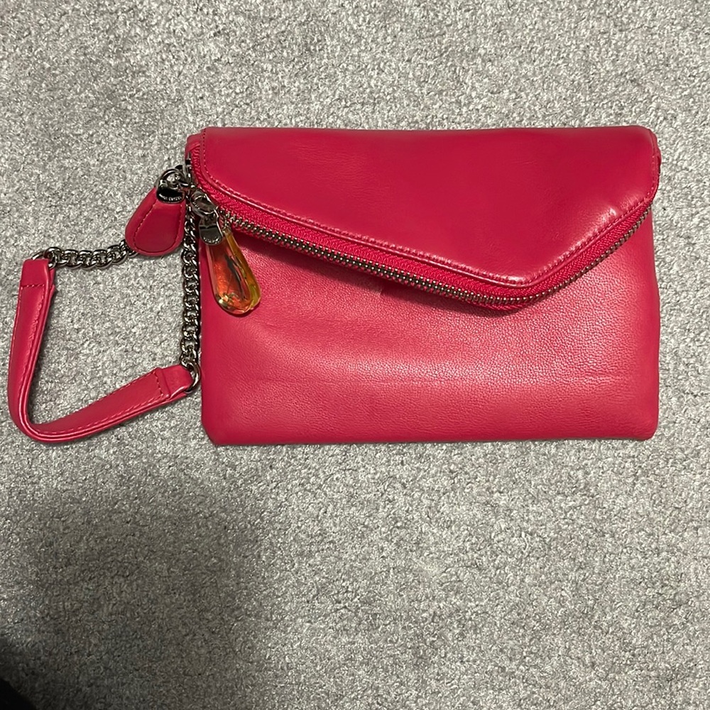Henri Bendel Wristlet in redish pink color